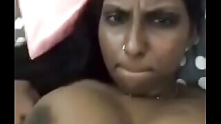 Desi auntie organizes groceries, then gets naughty, showing off her hairy pussy.