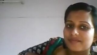 Indian beauty with big natural breasts in an erotic lactating scene, indulging in a sensual blowjob.