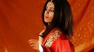 Sultry Indian beauty gives a sensational blowjob in a steamy bathroom scene.
