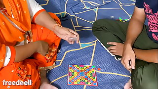 Indian wife and partner play Ludo, leading to erotic encounter.