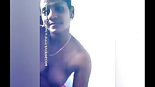 Tamil girl flaunts her natural boobs and plays with budding nipples.
