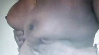 A Tamil aunty seduces with her big boobs and gets down and dirty.